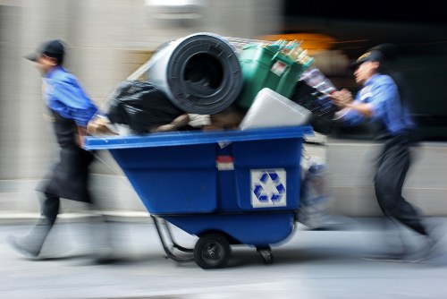Worker wearing PPE during waste sorting